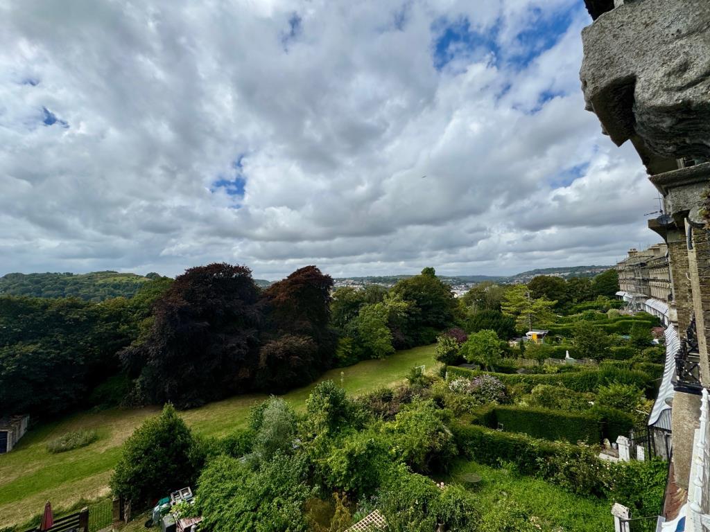 Lot: 53 - THREE-BEDROOM APARTMENT IN PERIOD BUILDING - View from living room toward the town